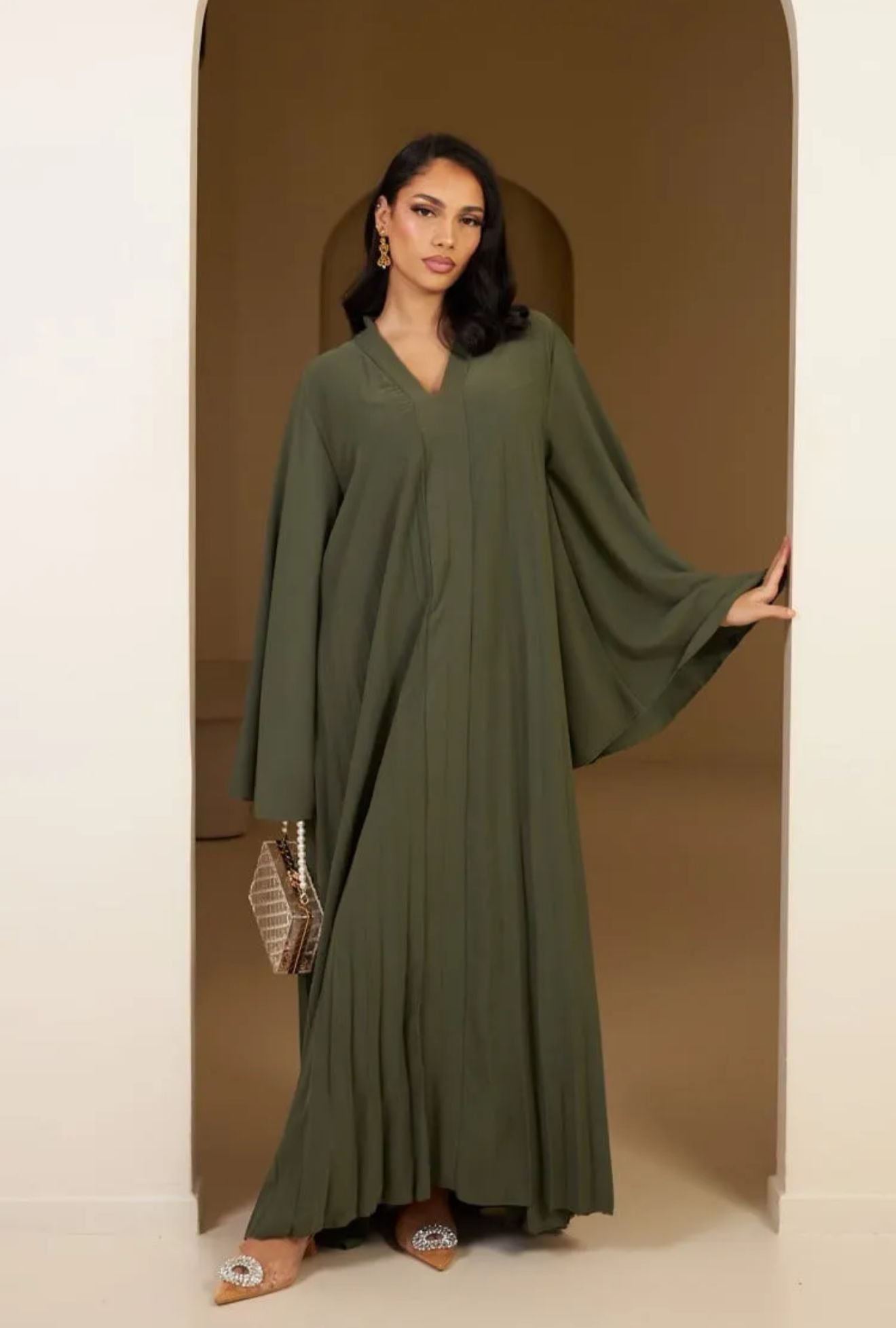 Dina Abaya